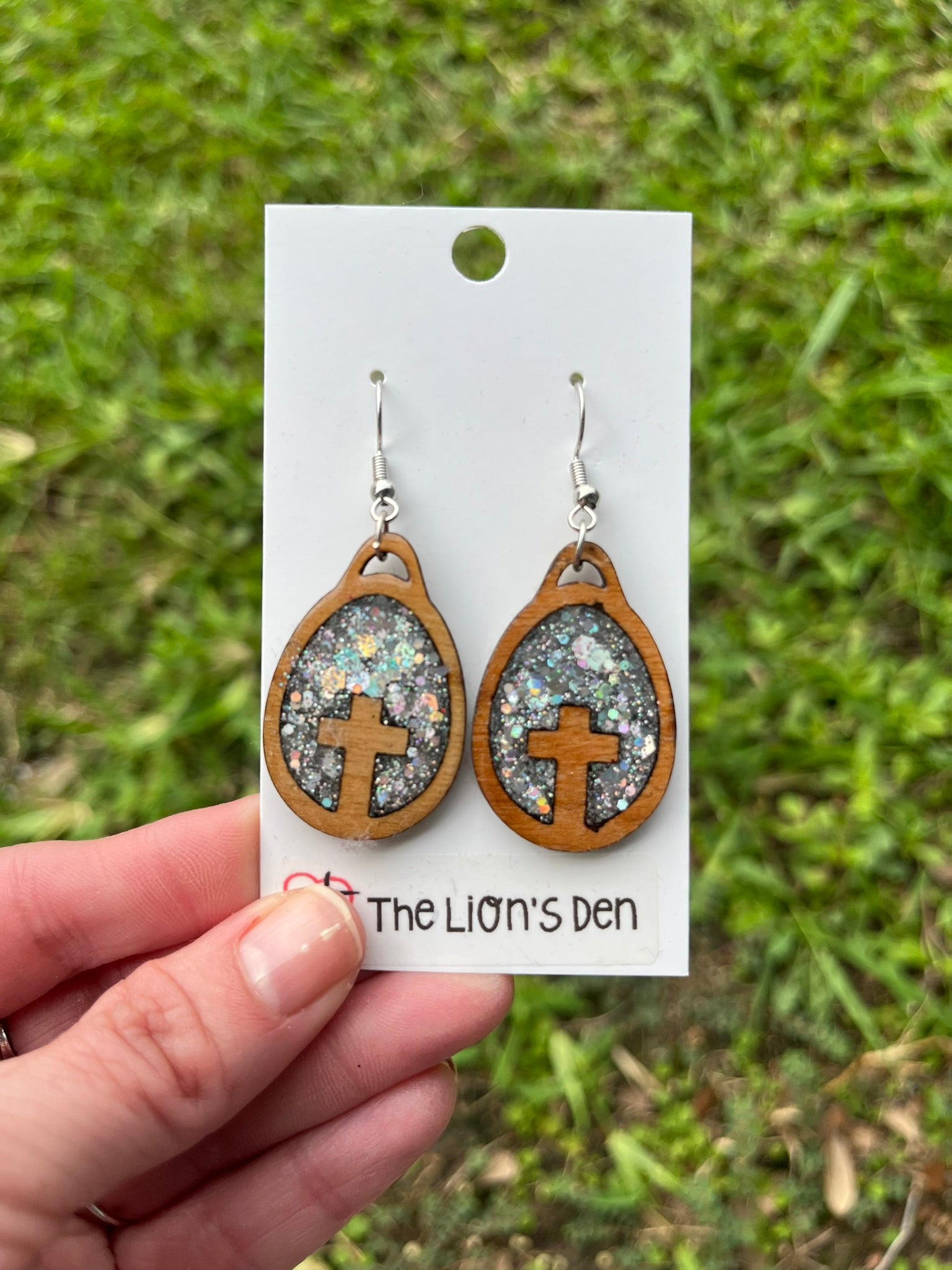 Oval silver glitter crosses